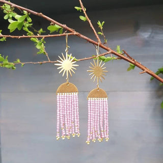 Glowing gold celestial earrings with fine Japanese glass beads in Syringa Lilac. 'Hera Oracle' gold plated brass and hand beaded earrings by Nic Danning Jewellery.