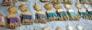 A rainbow of beaded earrings, handmade by Nic Danning.