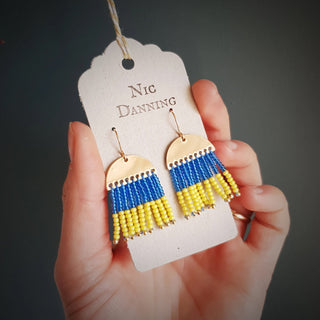 Hand beaded earrings in yellow and blue beadwork to honour the Ukrainian flag. Charity fundraiser earrings in support of the humanitarian crisis in Ukraine.